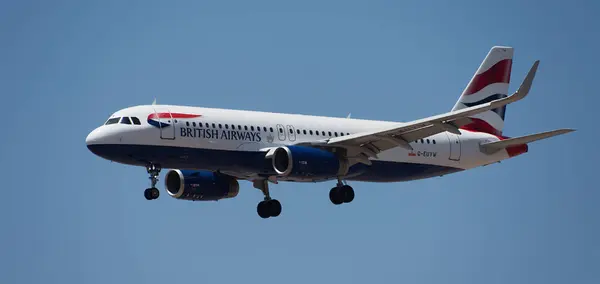 stock image Tenerife, Spain june 23st, 2024. Airbus A320-232 British Airways Airlines flies in the blue sky. Landing at Tenerife Airport