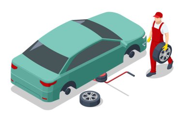 Lastik montajında tekerlek değiştiren adam.