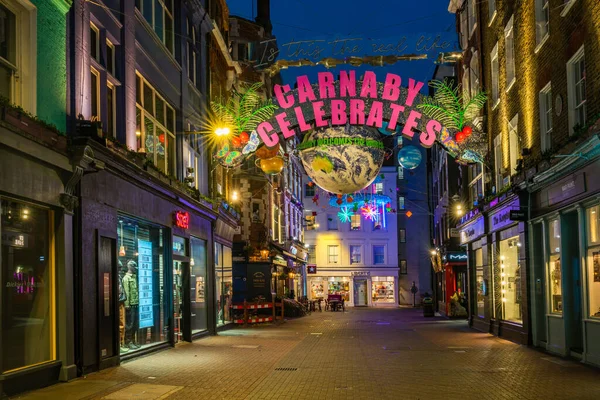 stock image LONDON, UK - NOVEMBER 12, 2022: Carnaby Street Christmas decorations this year are a compilation of the best from the past 25 years and incorporate elements of 14 different themes