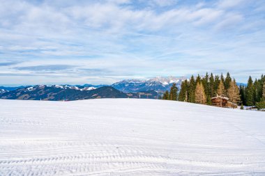 Wintry landscape on Hahnenkamm mountain in Austrian Alps in Kitzbuhel. Winter in Austria