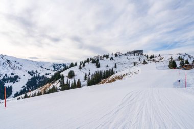 Wintry landscape on Hahnenkamm mountain in Austrian Alps in Kitzbuhel. Winter in Austria