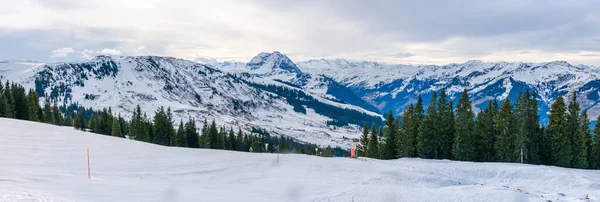 Panoramic view of wintry landscape in Austrian Alps in Kitzbuhel. Winter in Austria