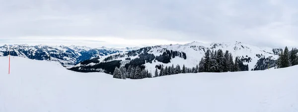 Panoramic view of wintry landscape in Austrian Alps in Kitzbuhe. Winter in Austria