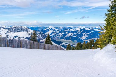 Wintry landscape on Hahnenkamm mountain in Austrian Alps in Kitzbuhel. Winter in Austria