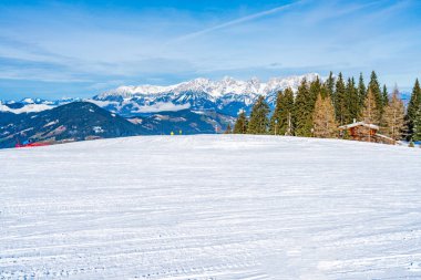 Wintry landscape on Hahnenkamm mountain in Austrian Alps in Kitzbuhel. Winter in Austria