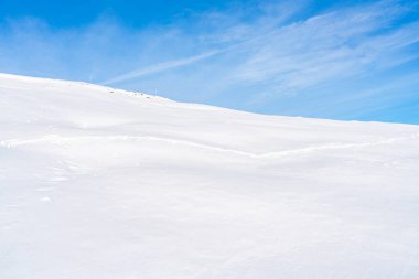 Wintry landscape on Hahnenkamm mountain in Austrian Alps in Kitzbuhel. Winter in Austria