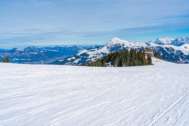 Wintry landscape on Hahnenkamm mountain in Austrian Alps in Kitzbuhel. Winter in Austria