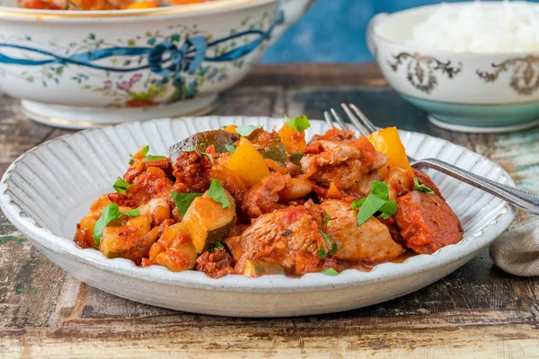 stock image Spanish chicken stew with red wine, chorizo and vegetables