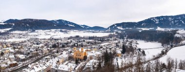Wide panoramic aerial view of Brunico (Bruneck), South Tyrol, Italy in the winter. clipart