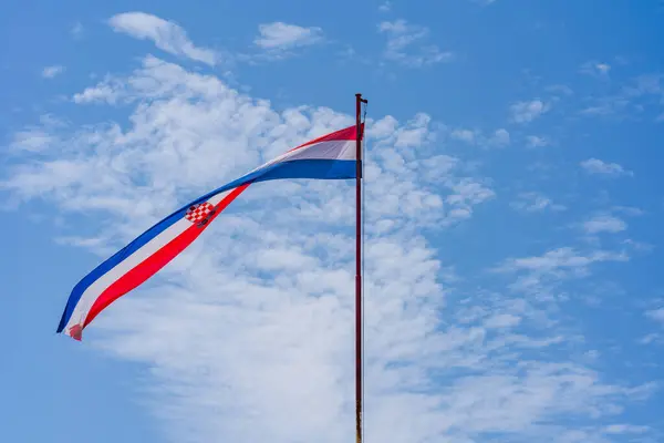 stock image Croatian flag flying against blue sky