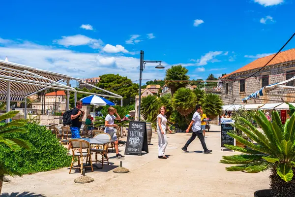 stock image LOPUD ISLAND CROATIA - JUNE 28, 2024: Holidaymakers enjoy summer vacation ON Lopud, one of the Elaphiti islands in the Adriatic Sea off the coast of Dalmatia