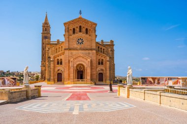 GHARB, GOZO - SEPTEMBER 01, 2024: The Basilica of the National Shrine of the Blessed Virgin of Ta' Pinu is a Roman Catholic basilica and national shrine located near the village of Gharb on Gozo. clipart