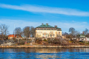 STOCKHOLM, SWEDEN - 08 Mart 2025: Stockholm şehir merkezindeki Curgarden Adası tarihi binalar, anıtlar ve müzelere ev sahipliği yapmaktadır