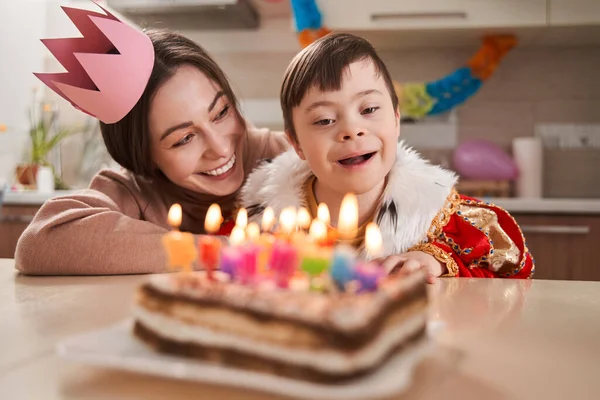 Cute Boy Syndrome Looking Interest Cake Candles While Celebrating His — Stock Photo, Image