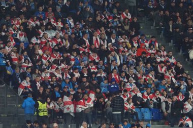 Gürcistan taraftarları, Napoli ve Eintracht Frankfurt arasındaki Uefa şampiyonlar ligi maçında Napoli 3, Eintracht Frankfurt 0. Maç Diego Armando Maradona stadyumunda oynandı..
