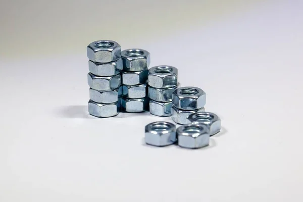 Chromed Screw Nuts Arranged Industrial Background — Stock Photo, Image