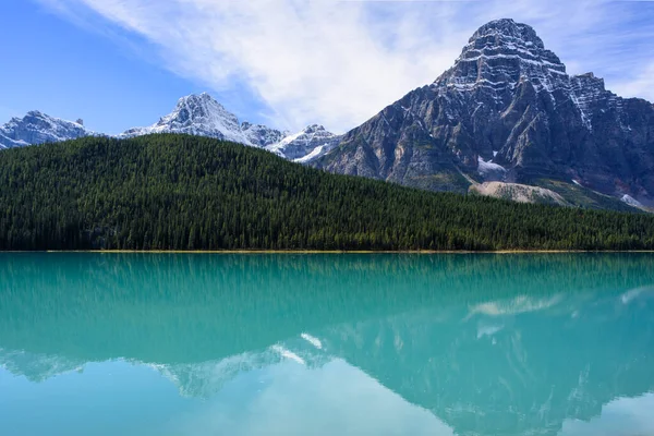 Scenic view of Mt Chephren, Waterfowl Lake, Saskatchewan River Crossing, Canadian Rockies, in Banff National Park, with rugged mountains and reflections in the turquoise water of Waterfowl Lake, photographed from the Icefields Parkway.