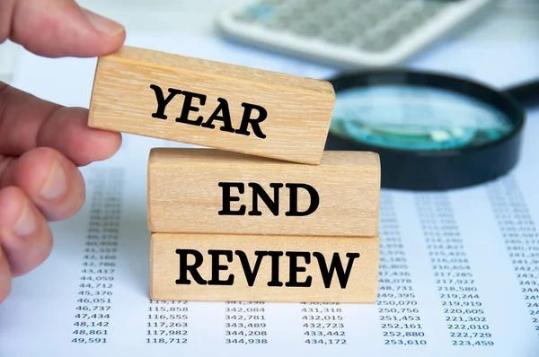 Stock image Year end review text on wooden blocks. Year end review concept.