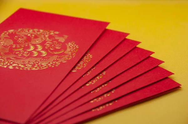 Chiński Nowy Rok Pakiety Żółtym Tle — Zdjęcie stockowe