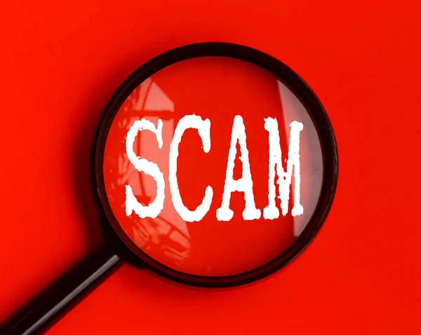 Scam Text Red Cover Magnifying Glass Scamming Fraud Concept — Stock Photo, Image
