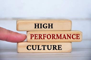 High performance culture text on wooden blocks. Business culture and Operational excellence concept. clipart