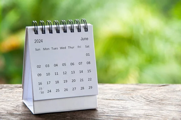 stock image June 2024 table calendar with customizable space for text. Calendar concept and copy space