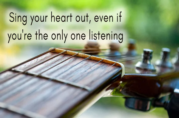 Motivational and inspirational quote - Sing your heart out, even if you\'re the only one listening. With Guitar background