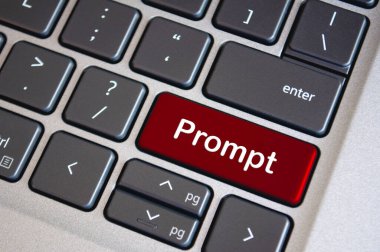 Prompt text on red laptop keyboard. Prompt concept. clipart