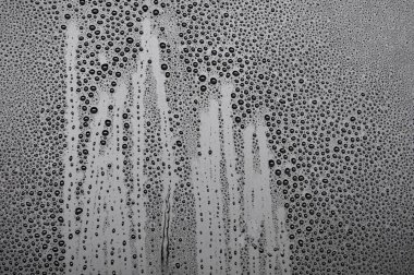 Tasarım veya duvar kağıdı arkaplanı için uygun su damlacıklarının alt kenar görünümü.