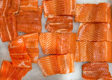 Top view of fresh salmon fillet display for selling in wet market clipart