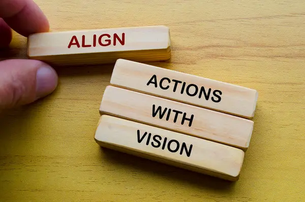 stock image Align actions with vision text on wooden blocks. Operational Excellence concept.