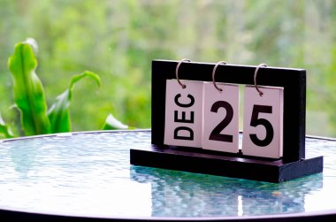 25 December calendar on marble table with customizable space for text. December calendar concept. clipart