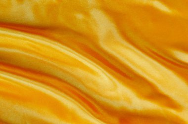 Tasarım ve duvar kağıdı arkaplanı için uygun ipeksi parıltılı sarı ipek kumaş.