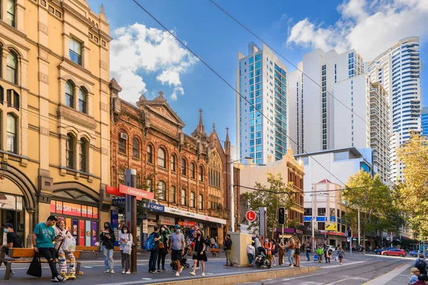 stock image Sydney, Australia - April 16, 2022: Chinatown light rail stop with people waiting for tram on a bright day in Sydney City