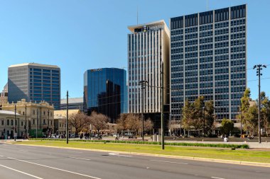 Adelaide, South Australia - August 23, 2019: Angas, Flinders University and State Administration Centre buildings viewed across Victoria Square on a bright day