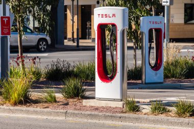 Adelaide CBD, Australia - August 23, 2019: Free Tesla cars Super Charger EV charging station in the Adelaide City centre on Franklin Street on a day