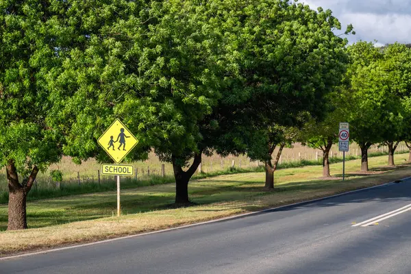 School zone road sign on a day in rural area of Victoria, Australia