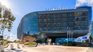 Adelaide, South Australia - July 14, 2024: South Australian Cancer Research (SAHMRI) front entrance viewed from the North Terrace on a bright day clipart