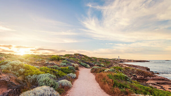 Robe Coastal Walk with lighthouse in background during sunrise, Limestone Coast, Guichen Bay, South Australia