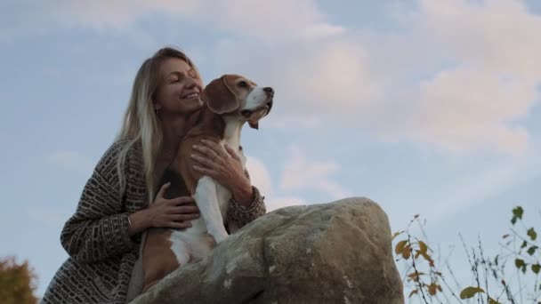 Woman Hugs Her Beloved Dog Girl Enjoys Sunset Company Her — Stock Video