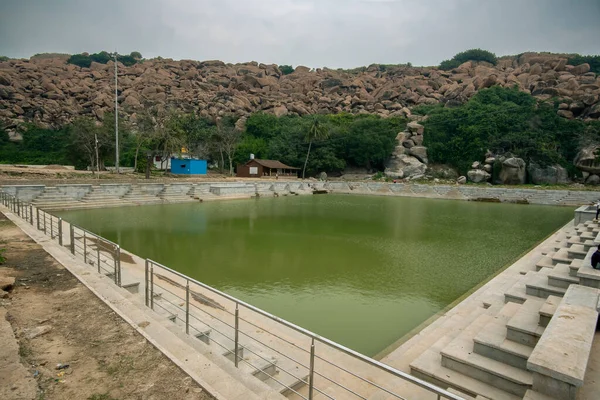 stock image Pampa lake near Hampi is one of the most sacred lakes in Hinduism. Hampi, the capital of the Vijayanagar Empire, is a UNESCO World Heritage site.