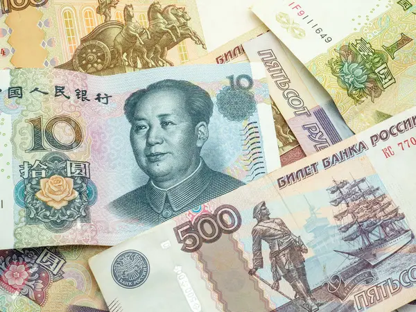 俄罗斯卢布和中国人民币纸币 贸易金融概念 — 图库照片