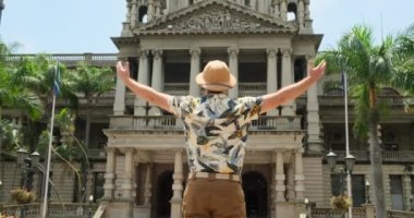man traveler enjoying cityscape takes picture on phone photographing landmark. Tourism traveling in Spain. . Display of love, affection by elderly people. Person touching moment. traveler in europe