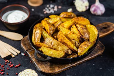 fried potatoes Rustic potato with garlic and spices