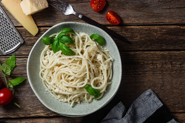 stock image Spaghetti with parmesan cheese in a plate. Pasta with cheese