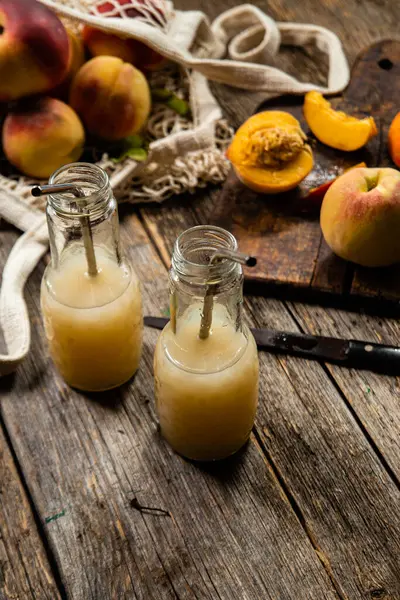 Peach Juice Bottle Wooden Background — Stock Photo, Image