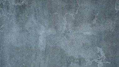 İnce desenli ve gri tonlu sert beton duvar dokusu..