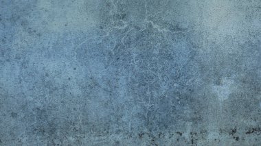 İnce varyasyonlar ve kalıplarla desenli mavi beton yüzey.