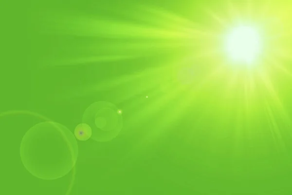 Natural green background with summer sun and lens flare.Sunlight on green natural background.