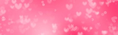 Sevgililer Günü arkaplanı pembe kalpler ve bokeh.